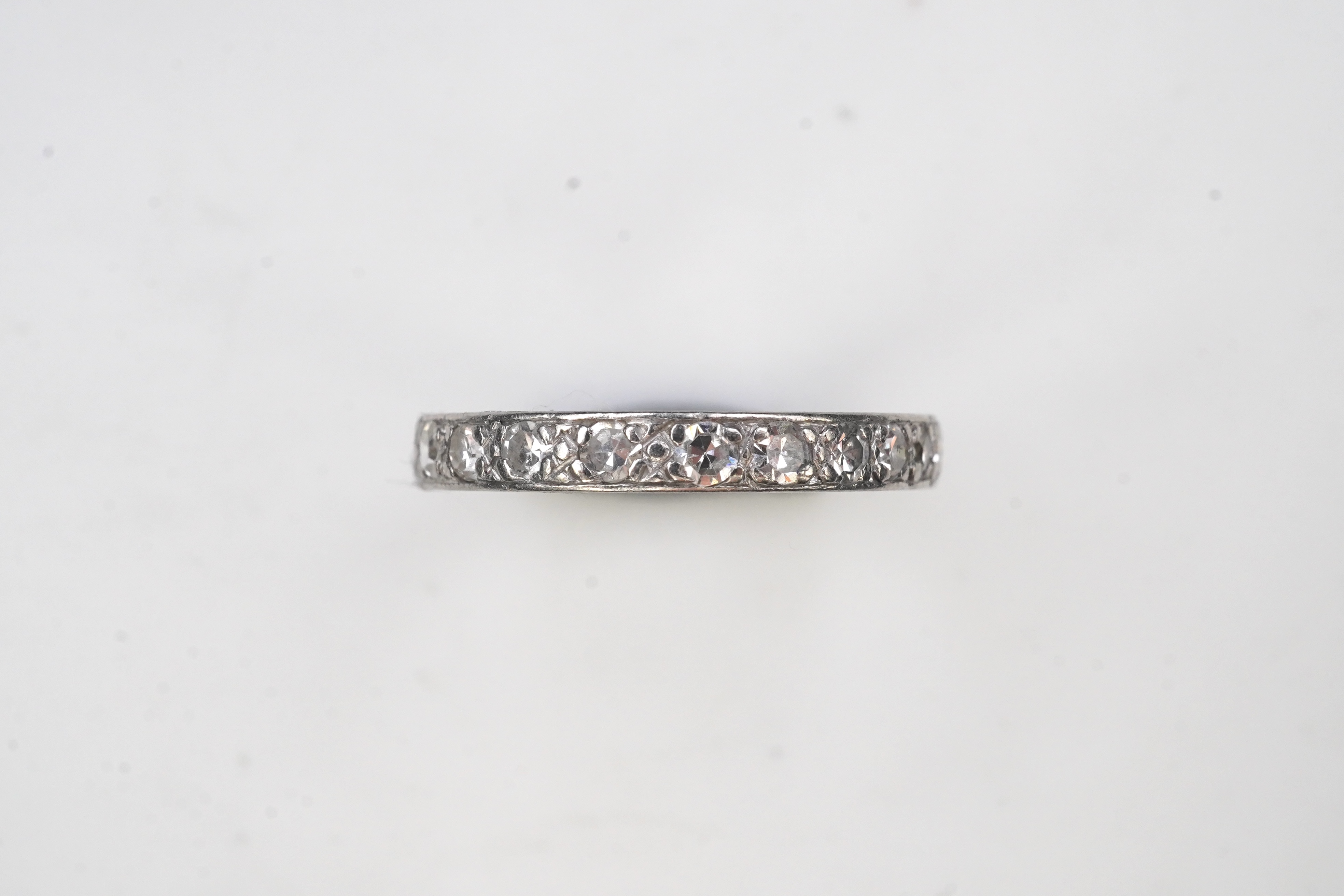 A diamond eternity ring, mid 20th century